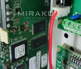 Uszkodzony moduł komunikacyjny Satel ETHM-1 w centrali alarmowej