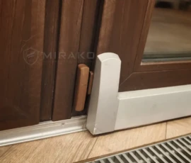 Czujka wstrząsowo-magnetyczna na dużych przesuwnych drzwiach tarasowych